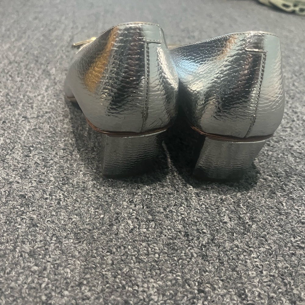 Roger Vivier silver shoes with silver buckle
